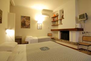 Family quad with garden view, garden, private facilities (bath and shower), and breakfast